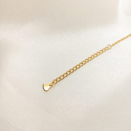 Photo d'une rallonge de chaine en or avec un coeur